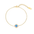 Elegant gold chain bracelet featuring a square blue gemstone surrounded by white zircons - Square Charm Bracelet / Gold (Blue Stone)