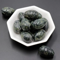 Polished Kambaba Jasper egg stones in a green speckled pattern with a white bowl - Kambaba Jasper (1pc)