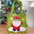 Green Christmas gift bag with Santa Claus embroidery and white snowflake prints - Green Santa Claus Style