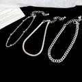 Detailed view of silver-tone triple chain set featuring snake, bead, and curb chain links - Silver (3-Piece Set)