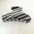 Acetate shark hair claw clip featuring black and white stripe pattern for women - Grey White Swirl