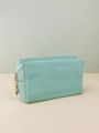 Waterproof lake green PU leather makeup bag with gold zipper and cross pattern finish - Cyan