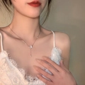 Elegant silver bow pendant necklace featuring sparkling crystals and a delicate drop pearl - Silver Butterfly Wing Rhinestone Necklace (XL1754)