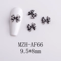 Detalle macro de lazos vintage para uñas en color gris plomo, tamaño 9,5x8mm - Lazo en Capas 3D (AF66) / Plata Antigua