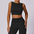 Two-piece black yoga set with high-waist pleated leggings and racerback sports bra - S / Premium Black