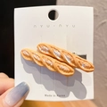 Pinza para el pelo creativa con forma de baguette en tarjeta blanca de marca - Baguette