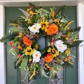 Summer eucalyptus wreath with sunflowers and orange roses on dark green door - 40cm Summer Multi-color Wreath