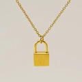 Collier cadenas doré avec pendentif lettre G gravée sur une chaîne à maillons O - Style Lettre G