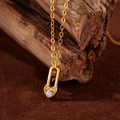 Elegant gold heart lock necklace with white zircon pendant on a vintage wood background - Heart Lock (WX1148) / 18K Gold