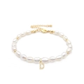 Macro detail of natural freshwater pearls and crystal-encrusted gold letter D charm - Letter D