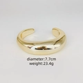 Brazalete rígido dorado irregular y grueso para mujer, diámetro 7,7 cm y peso 23,4 g - Estilo Minimalista Ancho (E)