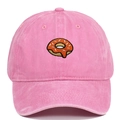 Close-up of pink washed cotton baseball cap with detailed donut embroidery - Pink