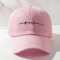 Close-up of the black Freedom embroidery on this pink premium cotton twill baseball cap - One Size / Pink