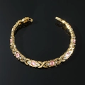Hip-Hop-Magnetarmband in Gold mit ovalen rosa Steinen und glitzernden Kristallen - Gold Rosa Strass Armband