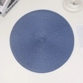 Blue round woven placemat in a minimalist European style for dining table protection - Royal Blue