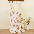 Detail of soft cotton nursing cover with brown bear patterns hanging on a wooden hook - Double Bears