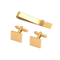 Macro view of polished gold stainless steel tie clip and cufflinks set for men - Gold Square Cufflinks + Tie Clip Set