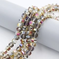 Macro shot of 8mm faceted multi-color crystal glass beads with iridescent coating - Purple Fuchsia
