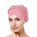 Detail of pink turban hat featuring woven braid texture and soft pleated fabric - Watermelon red