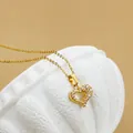 Golden titanium steel heart necklace with cubic zirconia stones on a white podium - No. 6 N0113 Gold
