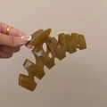 Extra large 13cm amber green wavy claw clip for thick hair shown in hand - 13CM Large N-Shape / Fruit Green