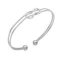 Polished silver cuff bangle featuring a double-wire design and a central knot motif - Rope Knot Ball / White K/Silver