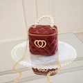 Quilted burgundy silicone bucket bag with pearl handle and golden heart detail - Red