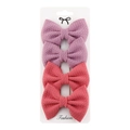 Detail of four ribbed polyester bow hair clips in lavender and coral pink on a display card - Lavender/Coral Pink