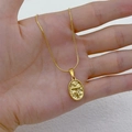Gold stainless steel snake chain necklace with an embossed oval cross pendant - Cross
