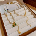 New Chinese natural stone pearl necklace with green square pendant and golden extension chain - White Pearl Fu Character Pendant Style