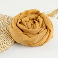 Detail of ginger yellow cotton linen scarf with frayed edges and woven texture - 190x100cm / Ginger Yellow