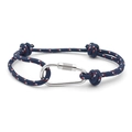 Detail of dark blue braided RPET rope bracelet with silver carabiner clasp and red dots - No. 12 Dark Blue with Red & White Dots