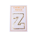 Detail of white chenille letter Z patch with gold glitter edge and peel and stick back - Letter Z / White