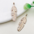 Golden feather shaped zinc alloy pendants for DIY necklace and bracelet jewelry making - 1 Piece/Pack (8x28mm)