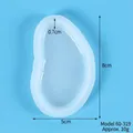 Detail view of heart puzzle silicone mold with dimensions 8x5x0.7cm for DIY resin craft - 60-319 Oval