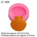 Pink silicone scallop shell mold with finished orange resin cast and dimension markings - No. 2 Shell / Pink