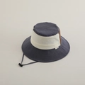 Detail of color-block kids bucket hat with adjustable chin strap and fabric brand label - 2-5 Years Old / Grey Color-block