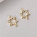 Macro detail of gold hexagram pendant with clear zircons and double hanging rings - Zirconia Hexagram Star Link Connector (H-2222)