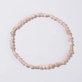 Elastic beaded bracelet with faceted pink stones and polished gold spacer beads - Morganite Pink
