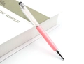 Rosa Stylus-Kugelschreiber gefüllt mit natürlichen rosa Kristallsteinen auf Buch - Rosenquarz 1.0