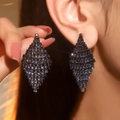 Macro shot of geometric black rhinestone stud earrings featuring a luxury pavé setting - Black Rhombus Full Rhinestone Earrings