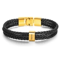 Close-up of triple-layer black leather woven bracelet with gold magnetic clasp and custom name slider - 19cm / 1 Name / Gold Clasp