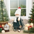 Christmas ski doll ornament with white knit hat and dark green tassel dress - K-TS22 Green Skiing Boy