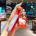 3D Hello Kitty figurine sitting on a pink donut keychain with striped wristlet - B470-7 Red Kt / Large