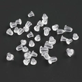 Transparente Silikon-Ohrstopper in Kugelform, lose Mengen auf schwarzem Grund - Kugel-Silikon-Ohrring-Verschluss / Transparent