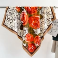 Detailed view of 90cm square silk scarf featuring rose print and contrast borders - 90x90cm / Orange