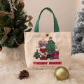 Christmas-themed cartoon canvas tote bag in off-white with green handles and festive print - Trendy Mouse Christmas