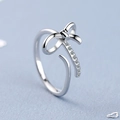 Elegant silver bowknot open ring with sparkling pavé cubic zirconia for women - Adjustable Open / White Gold