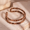 Macro shot of faux horsehair leopard print bangles on stone base showing fuzzy texture - Leopard Print Flocking Double Layer Bangle