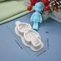 Detail view of elf-shaped silicone mold with product dimensions and a blue finished piece - Elf Shape (3)